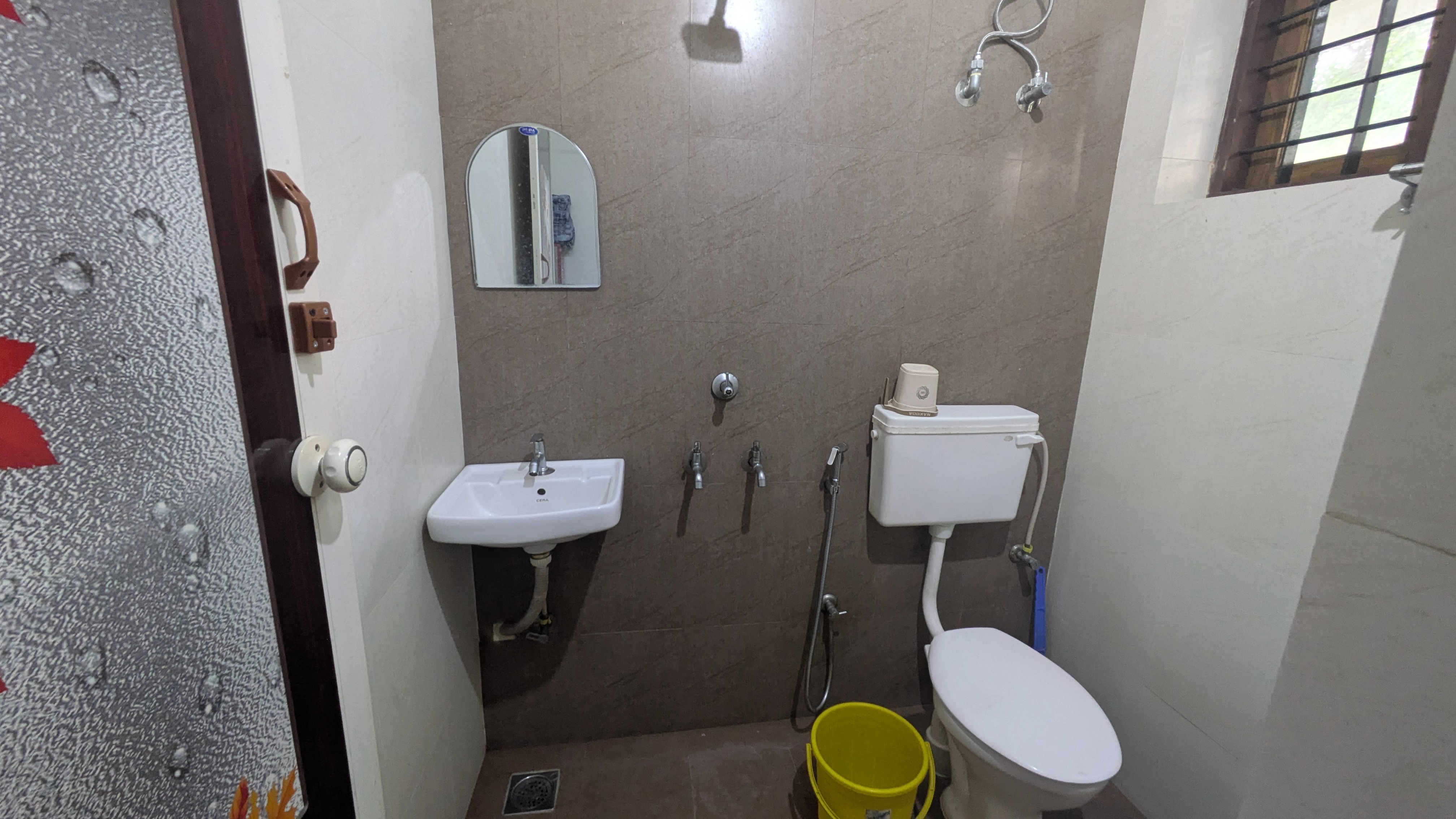 Clean and modern bathroom with hot water